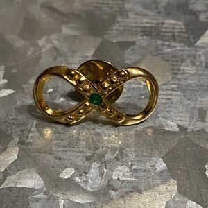 Gold Infinite Loop Brooch with Green Crystal Accent